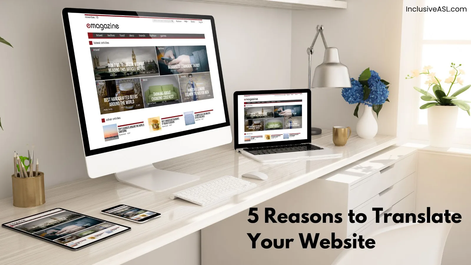 A modern workspace featuring a white desk with a desktop computer, laptop, tablet, and smartphone all displaying the same website design. On the right side of the desk are a vase with blue flowers, a white lamp, and a cup. The text "5 Reasons to Translate Your Website" written in bold black font on the bottom right corner. The website's URL, "InclusiveASL.com," appears in small text at the top right corner.